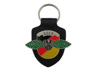 Llaveros de cuero personalizados GSG9, llaveros promocionales con el logotipo con el emblema suave del esmalte